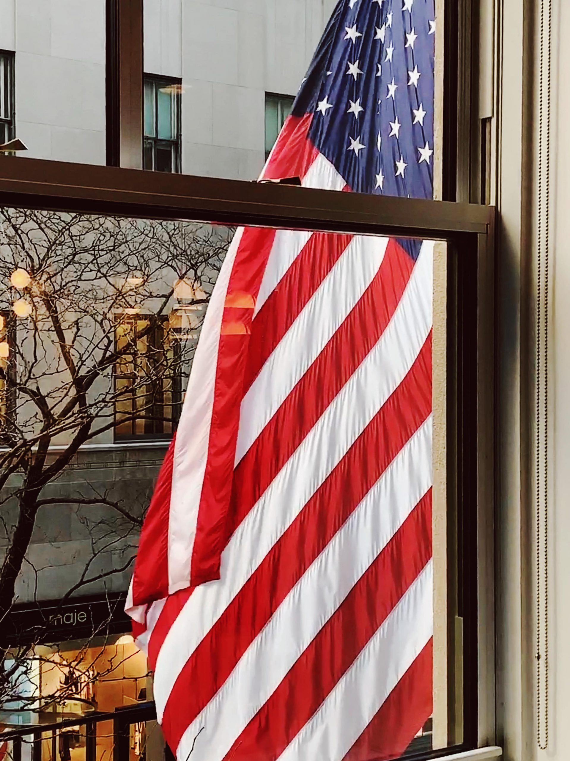 American flag hanging outside the building